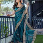 Teal Organza Saree With Silver Border